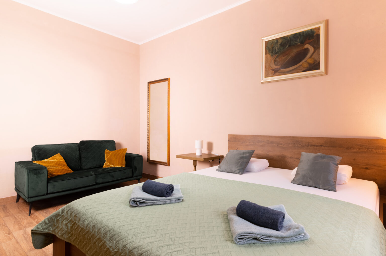 Full view of a stylish apartment bedroom, designed for comfort and relaxation