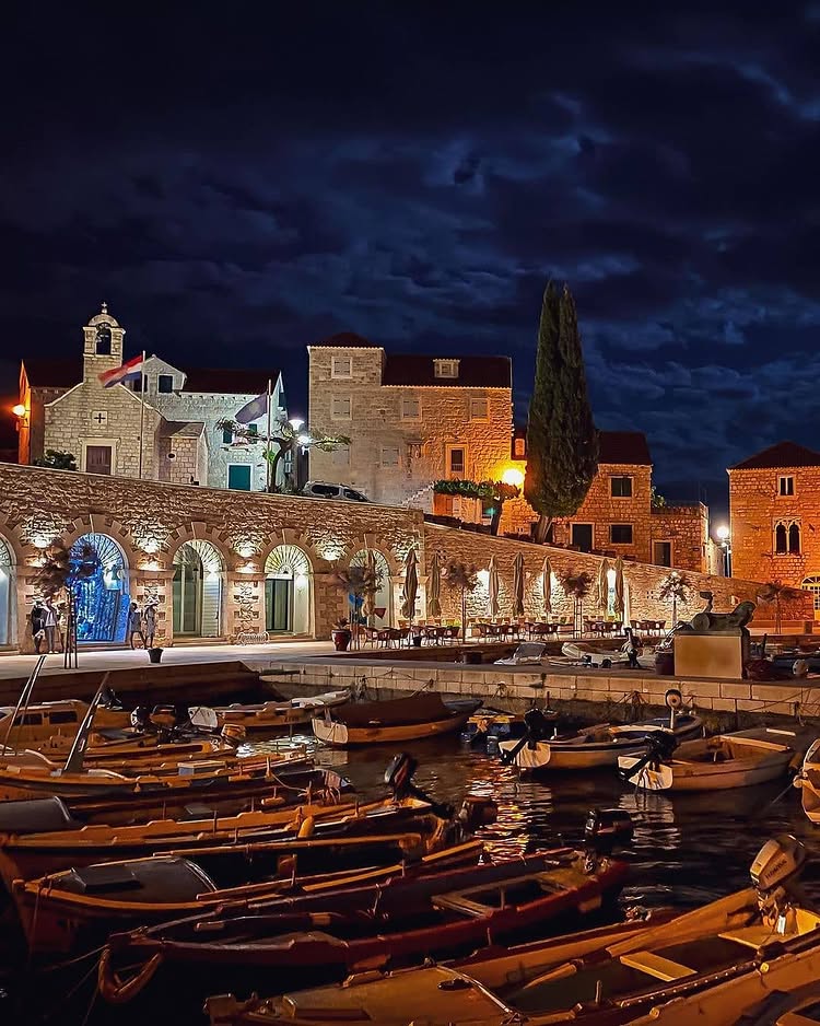 Lively summer festival at the Bol Marina, with music, food, and a vibrant atmosphere