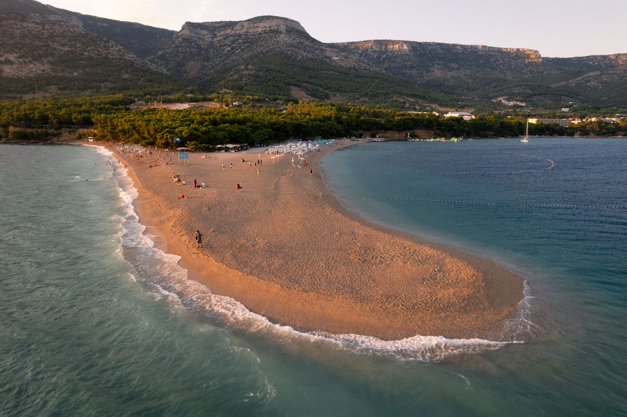Turquoise waters surrounding Zlatni Rat Beach, one of the most iconic destinations in Croatia